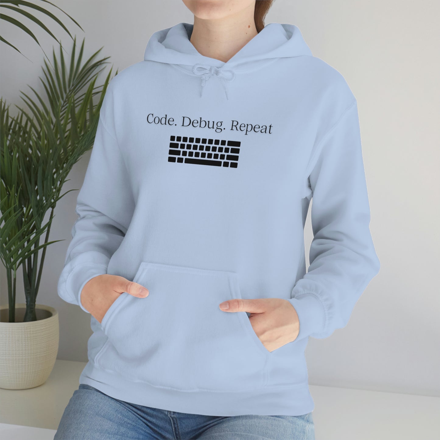 Wrap Yourself in Style and Functionality with Our Code.Debug.Repeat Unisex Heavy Blend™ Hooded Sweatshirt