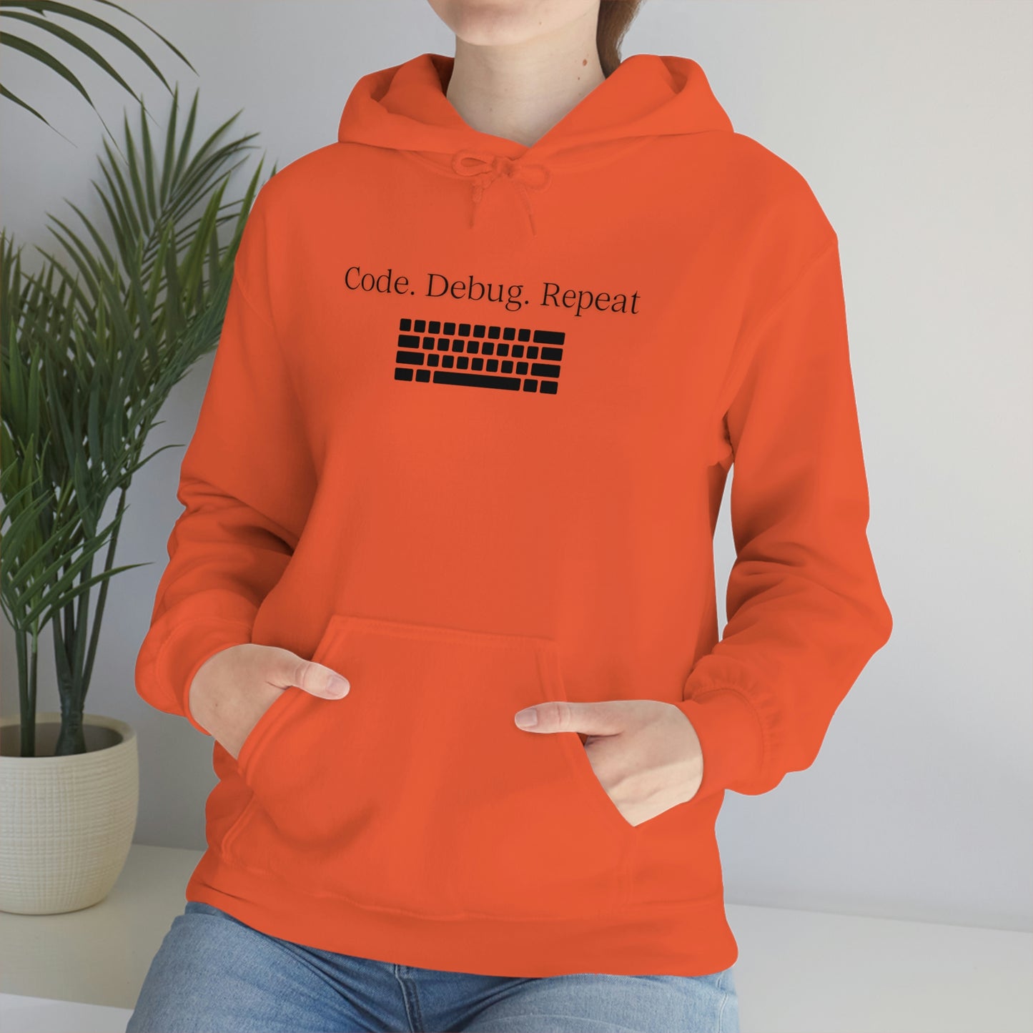 Wrap Yourself in Style and Functionality with Our Code.Debug.Repeat Unisex Heavy Blend™ Hooded Sweatshirt