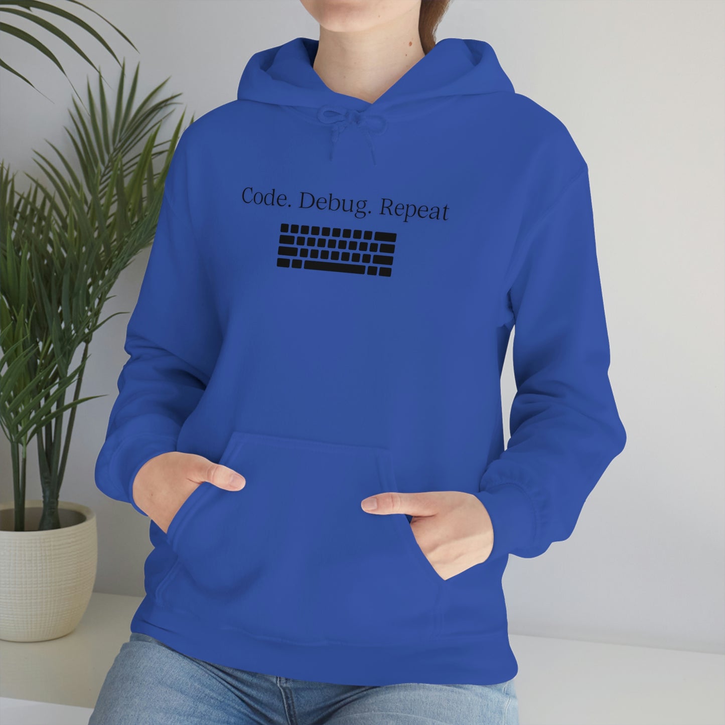 Wrap Yourself in Style and Functionality with Our Code.Debug.Repeat Unisex Heavy Blend™ Hooded Sweatshirt